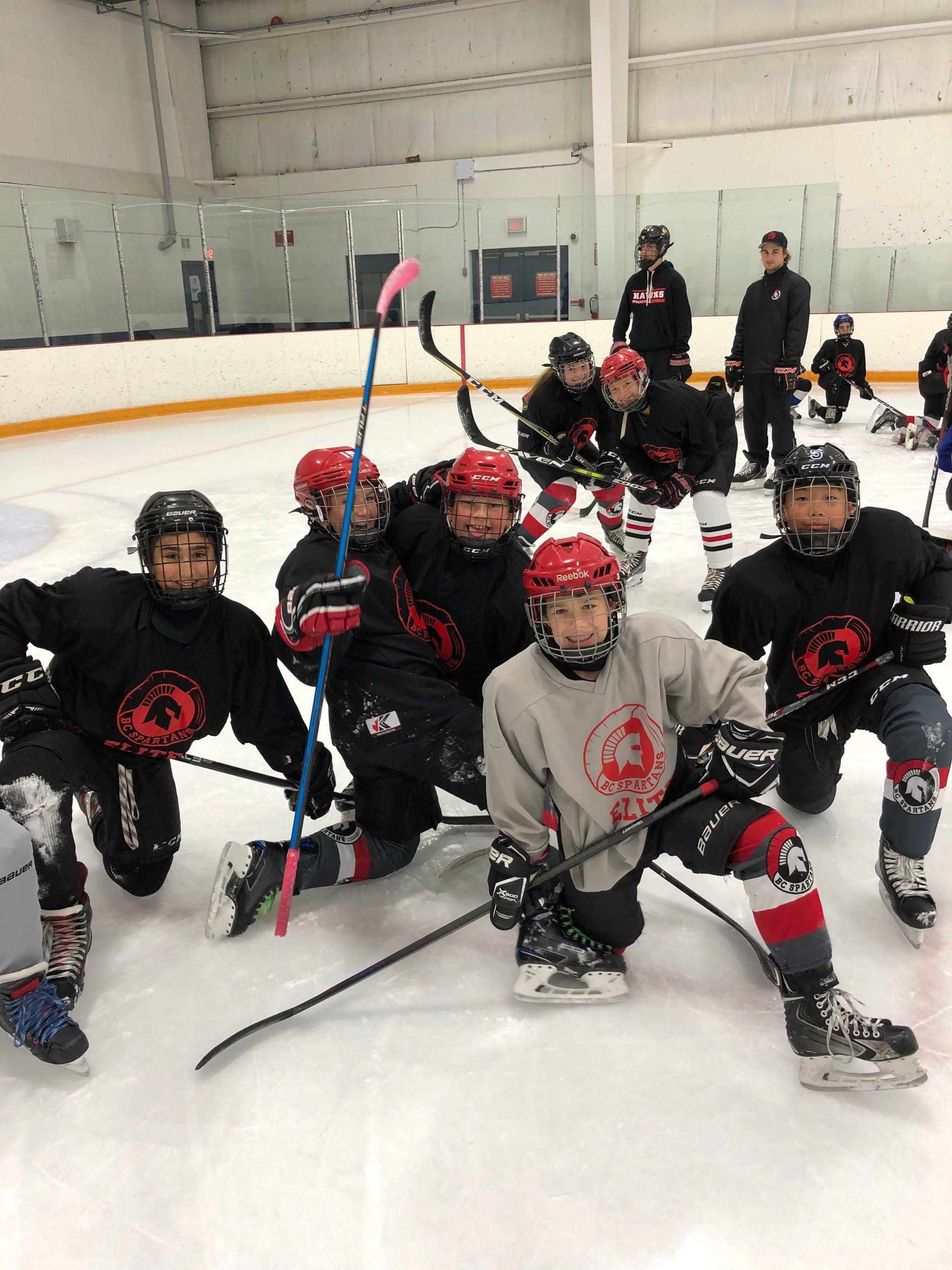 Spartans player driving through a puck control drill